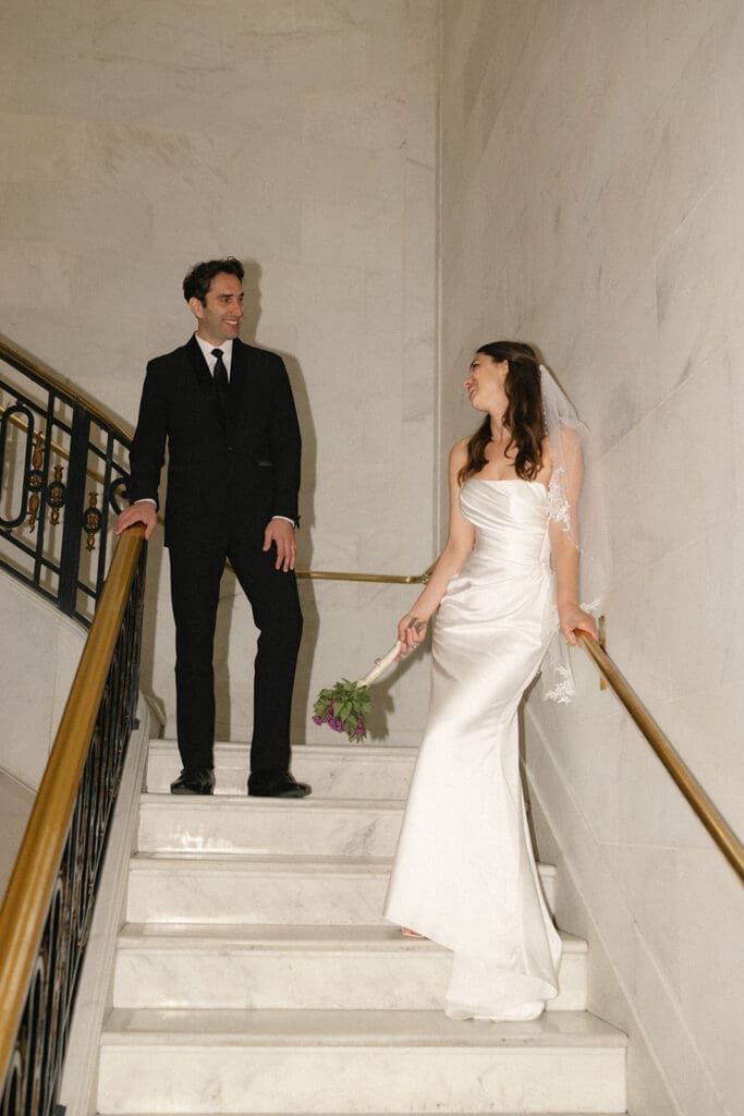 Bride and groom portrait inside San Francisco City Hall 