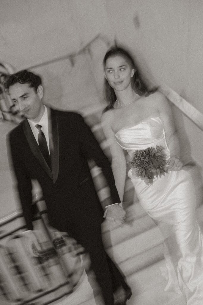 Blurry black and white photo of bride and groom portrait inside San Francisco City Hall 