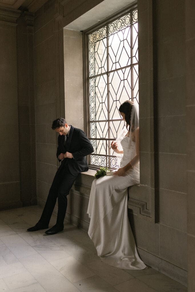 Bride and groom portrait inside San Francisco City Hall 