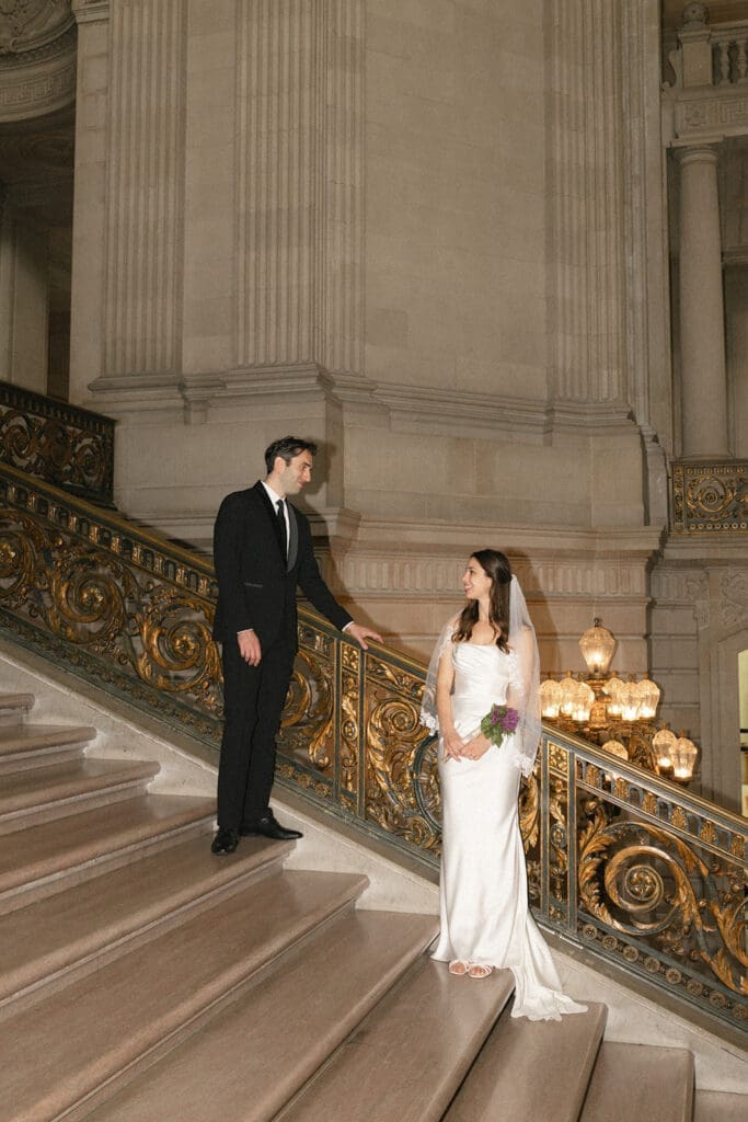 Bride and groom portrait inside San Francisco City Hall 