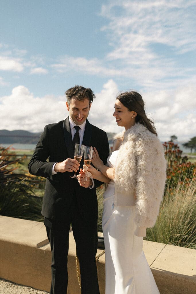 Bride and groom toast at Presidio Tunnel Tops