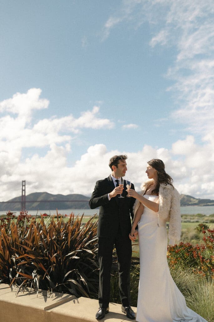 Bride and groom toast at Presidio Tunnel Tops