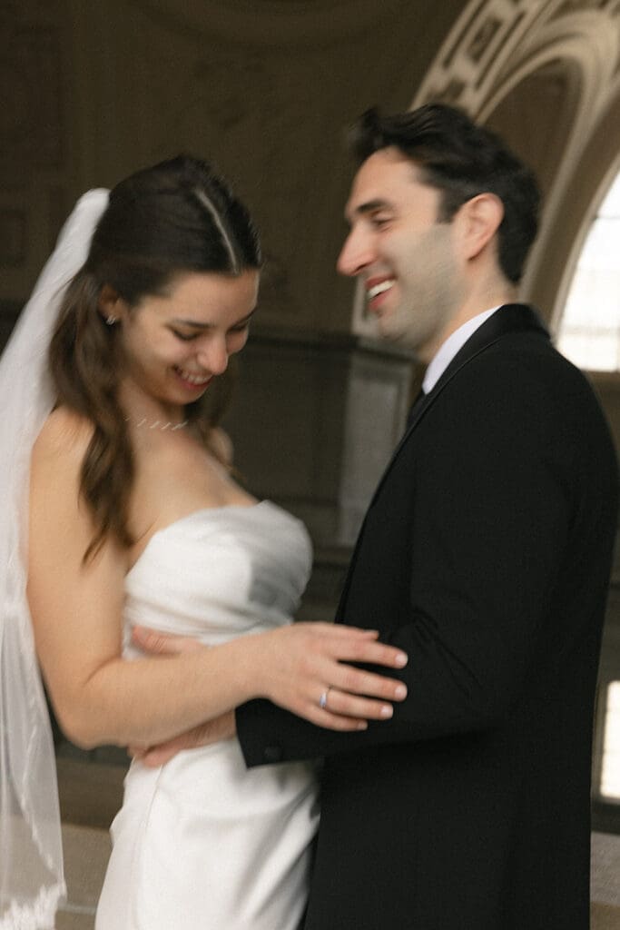 Bride and groom portrait on San Francisco City Hall 4th floor