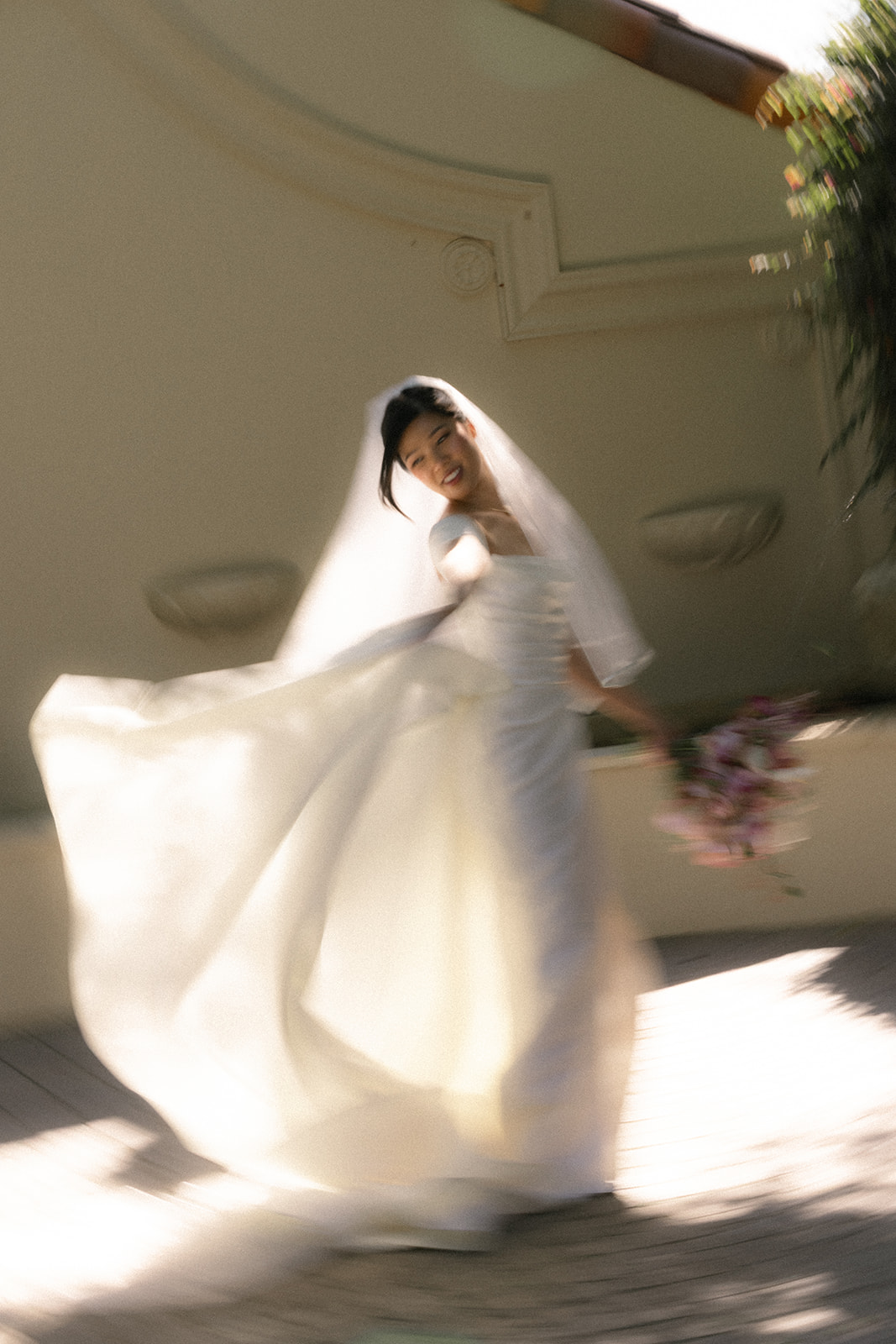 Bride twirling in her wedding gown with motion blur during portraits at casa real at ruby hill winery, captured in artistic casa real at ruby hill winery photos.
