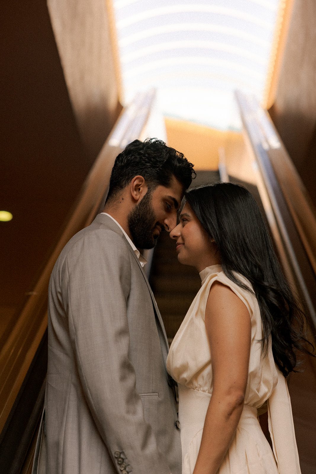 Close-up portrait of a couple touching foreheads inside the Marin County Civic Center during their Marin County Civic CenterElopement, captured by a Bay Area wedding photographer.