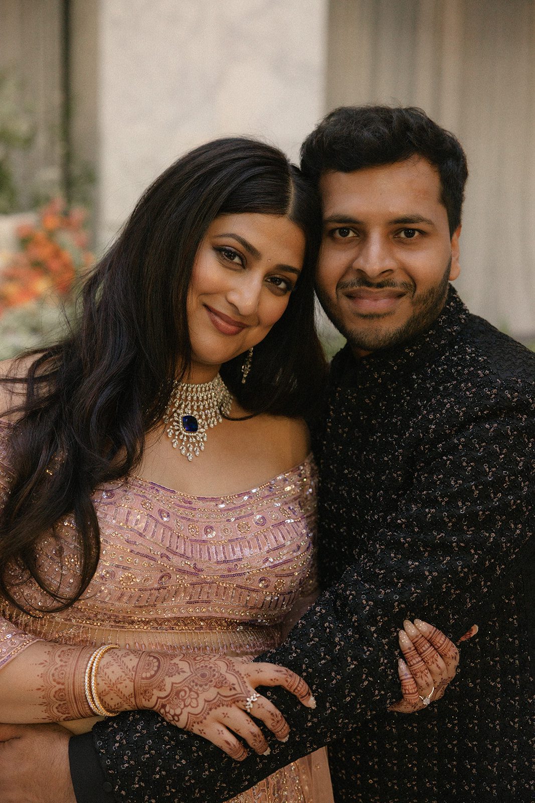 Close-up reception portrait of the newlyweds in embellished evening attire, captured by a San Francisco wedding photographer.
